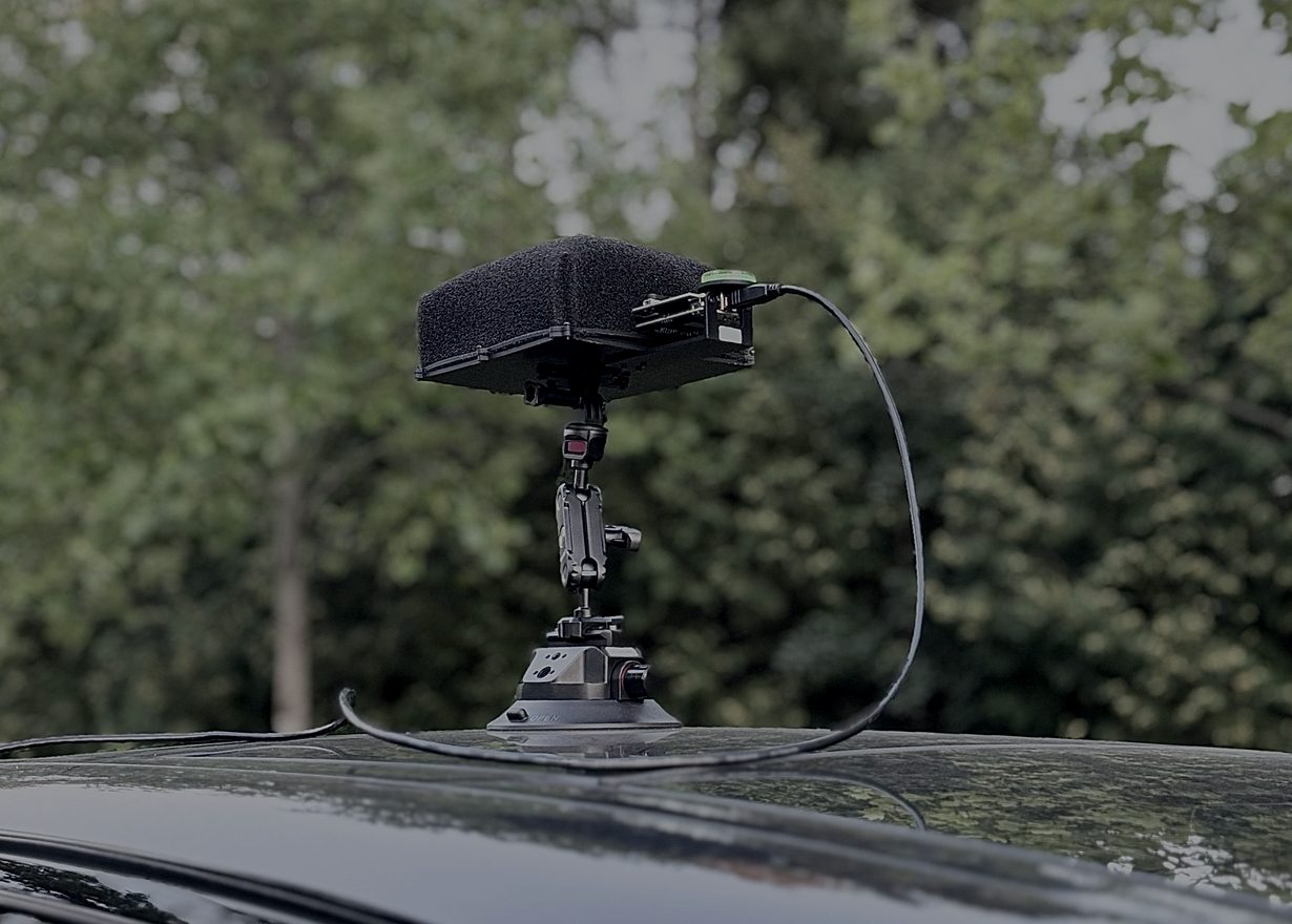 The GW-VNR1 acoustic array on a suction mount on a vehicle roof